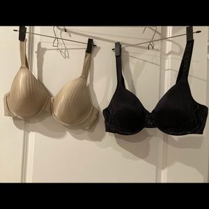 Two Playtex bras one beige one black with pretty appliqué. Both size 38C padded.